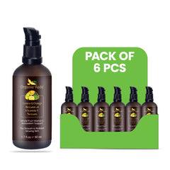 Six 50ml bottles of Organic Veda Lemon & Orange Botanical Vitamin C Serum with fresh citrus fruits and serum bottles.