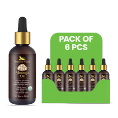 Six 50ml bottles of Organic Veda Moringa Oil displayed in a pack, showcasing clear glass bottles with white caps.