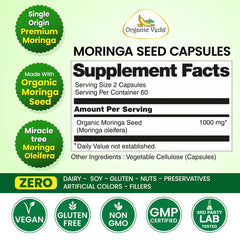 Organic Veda Moringa seed capsules in a clear bottle, showing the small, round, greenish capsules inside.