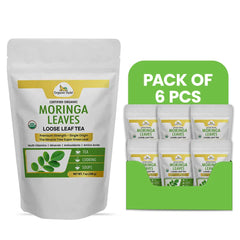 Organic Veda Moringa loose leaf tea powder in a 7oz pack, showing dried green moringa leaves in a natural setting.