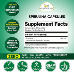 Organic Veda Spirulina Capsules, green supplement capsules in a clear bottle, displaying nutritious spirulina powder inside.